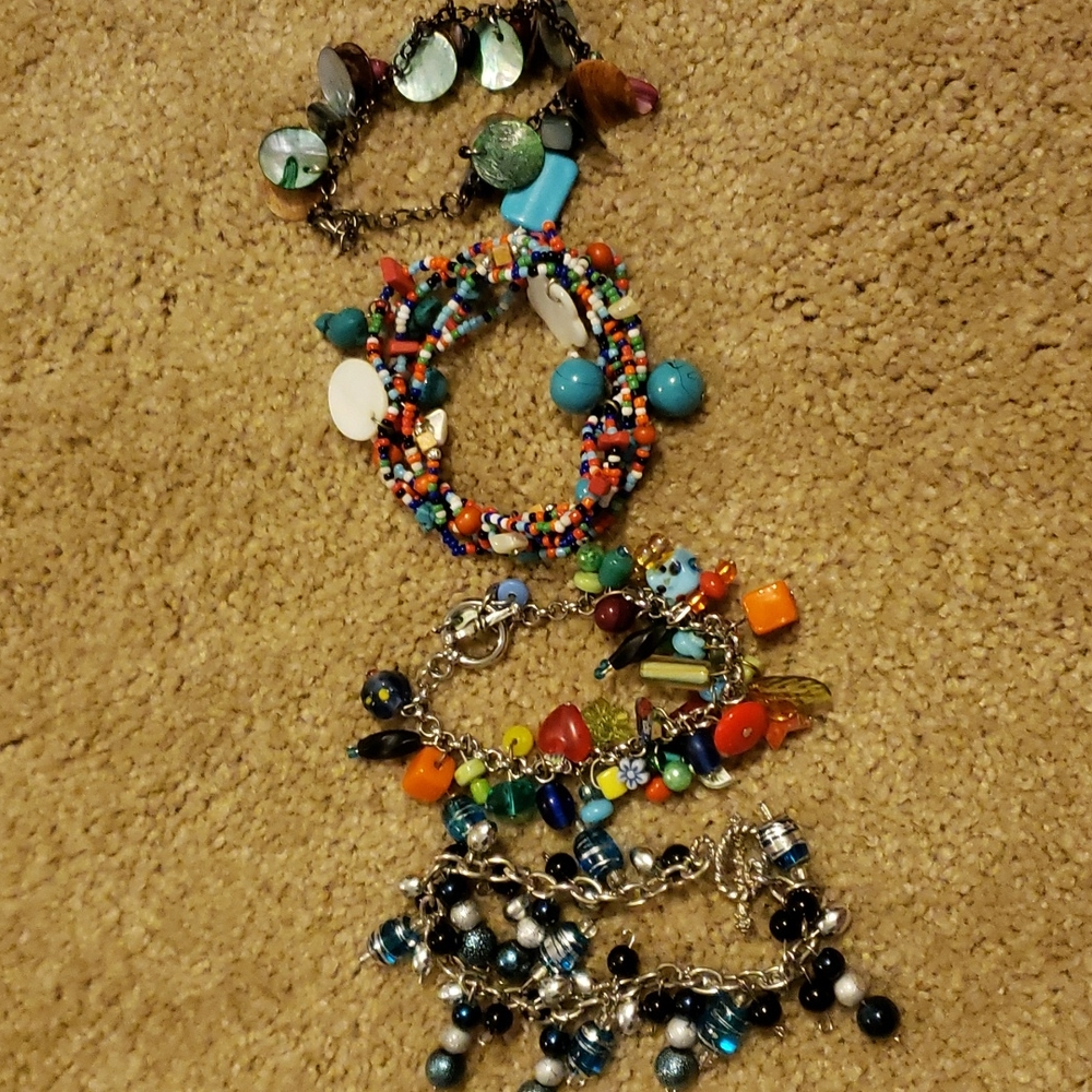 Handmade beaded, glass, and shell bracelets